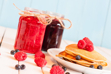 Stack of wheat golden pancakes or pancake cake with freshly
