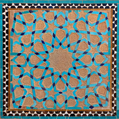 Traditional Old Islamic Design made of Brown Clay and Blue Tiles in Yazd