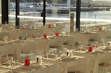 Sunlit restaurant near Oslo Fjord and Opera House