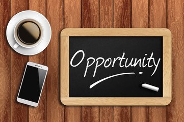 coffee, phone  and chalkboard with  word opportunity