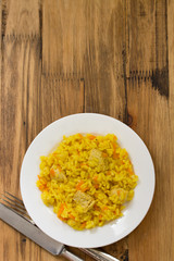 rice with meat and carrot on plate