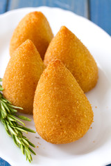 appetizer on white plate on blue background