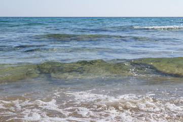 Small waves in crystal blue sea