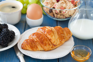 croissant with milk, egg, coffee