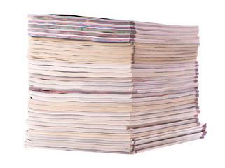 Stack of old magazines isolated