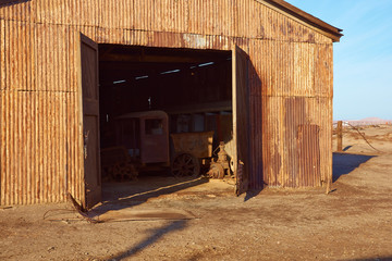 Derelict and rusting industrial building at the historic Humberstone Saltpeter Works in the Atacama Desert near Iquique in Chile. The site is now an open air museum and a Unesco World Heritage SIte. 