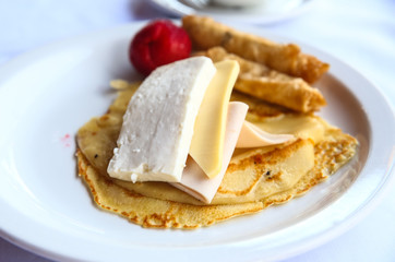 Pancake with cheese and ham