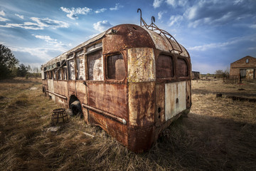 Chernobyl - Abandoned bus in a field