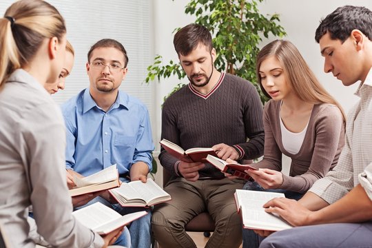 Group, book, studying.