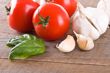 Tomatoes, garlic and basil. 