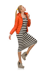 Young woman in long striped dress isolated on white