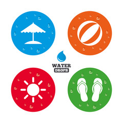 Fototapeta premium Beach holidays icons. Umbrella and sandals.