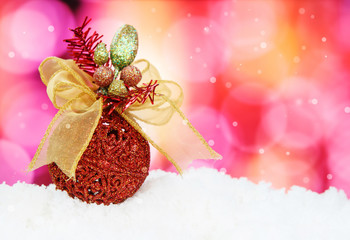 Christmas Background Made of a Red Ball and Beautiful Bokeh