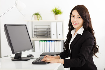 young business woman working in the office