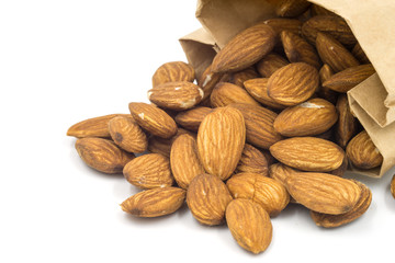 Almond in a brown bag on white background.