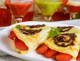 Pancakes with sliced strawberries