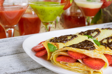 Pancakes with sliced strawberries