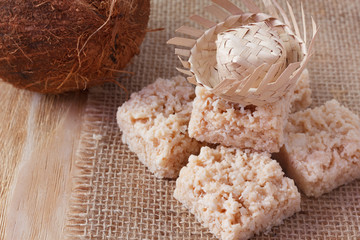 Coconut candy cocada on sackcloth