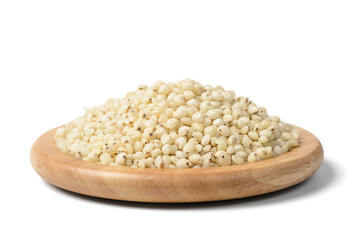 sorghum in the wooden plate, tilt shift lens