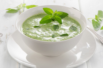 Creamy vegetable soup with herbs.