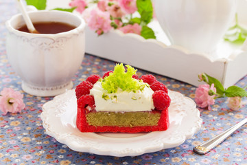 Tartlets with pistachio cream and raspberries.