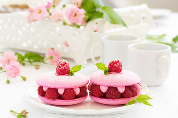 French makarons cake with raspberries.