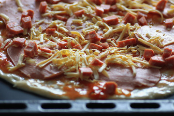 pizza cooking tomato sauce cheese sausage