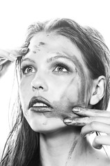 Girl with creative makeup. Black and white portrait.