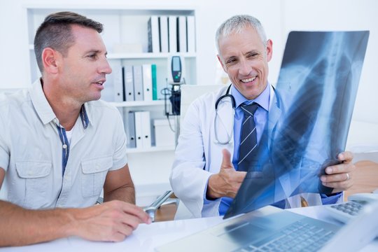 Doctor and patient looking at Xray