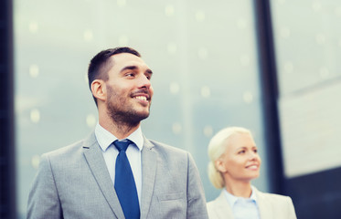 close up of smiling businessmen