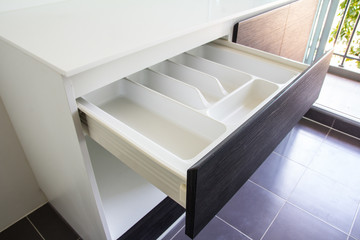opened white empty drawer