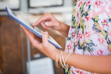 Woman using tablet computer