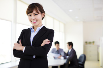 Young business woman working in the office