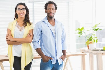 Obraz premium Portrait of smiling colleagues looking at camera