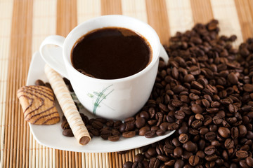 Coffee drink and freshly roasted coffee beans