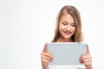 Happy woman using tablet computer
