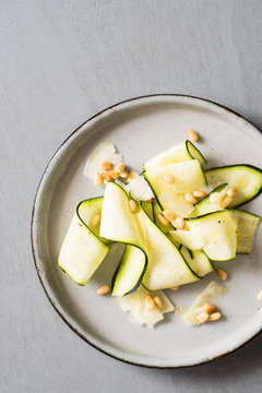 Raw Zucchini Carpaccio with Roasted Pine Nuts and Parmesan Shavings
