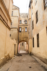 Fototapeta na wymiar Vintage old street in Lviv, walls with windows
