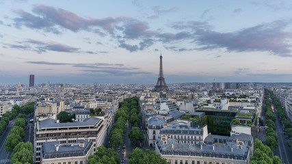 Skyline of Paris with eiffel tower at sunset