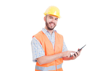 Friendly construction worker using tablet