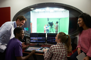 Students On Media Studies Course In TV Editing Suite