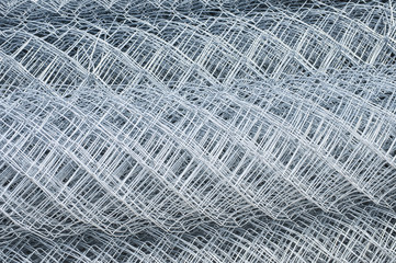 Rolled up metal galvanized fence nets closeup