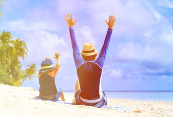 happy father and son on the beach