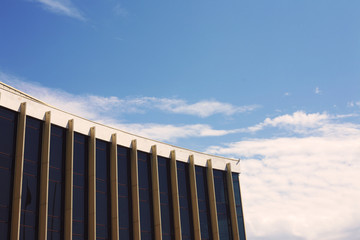 Modern glass silhouettes on modern building, sky cloud