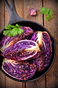 red cabbage baked in olive oil with chili pepper flakes and sea salt. vegetarian food.  image is tinted