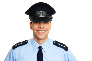 Smiling young policeman on white background