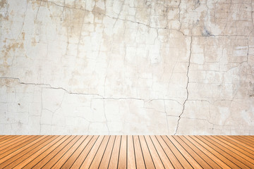 Empty room of grunge wall and wood floor