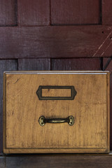 Old wooden drawer on a table
