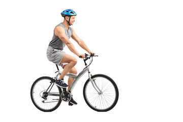 Young male biker riding a bicycle