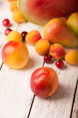 Fototapeta na wymiar Peach and other fruits